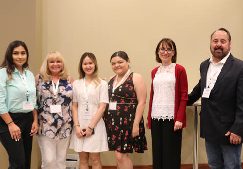 A photo of the 2018 Scholarship winners with the donators and President Valentia Purtell.