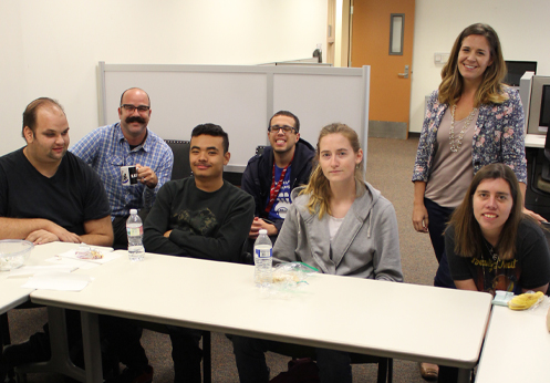 A group photo of DSS students and their counselor in the ARISE lab.