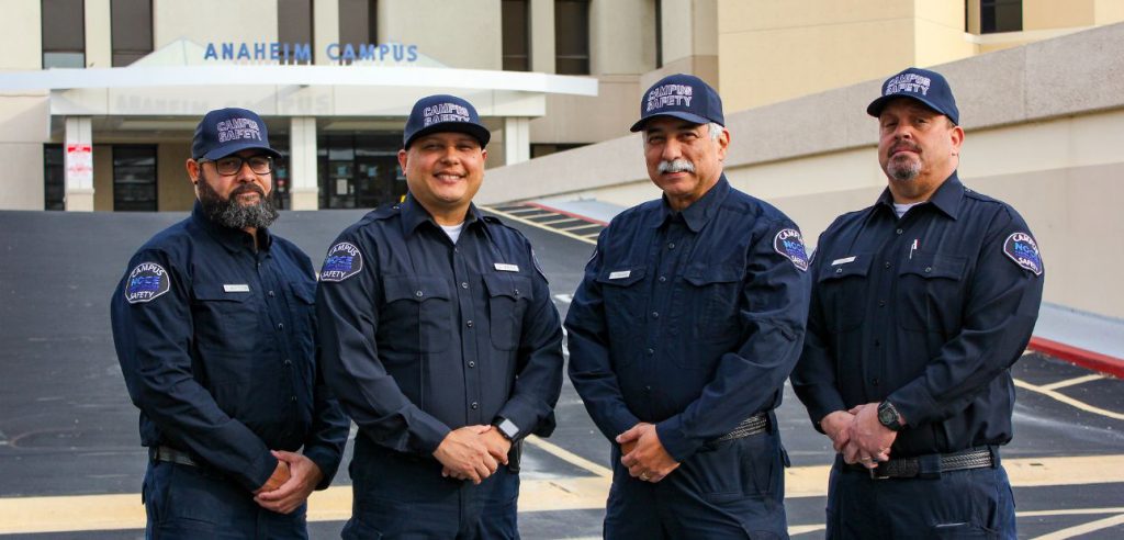 A group photo of the four male Anaheim Campus Safety officers.