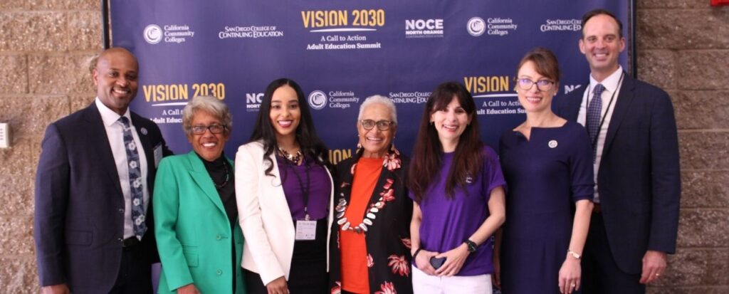Dr. Byron Breland (North Orange County Community College District Chancellor), Dr. Constance Carroll (California Community College Baccalaureate Association President and CEO), Dr. Tina M. King (San Diego College of Continuing Education President), Pamela Haynes (California Community Colleges Board of Governors), Dr. Sonya Christian (California Community Colleges Chancellor), Valentina Purtell (North Orange Continuing Education President) and Gregory Smith (San Diego Community College District Chancellor)