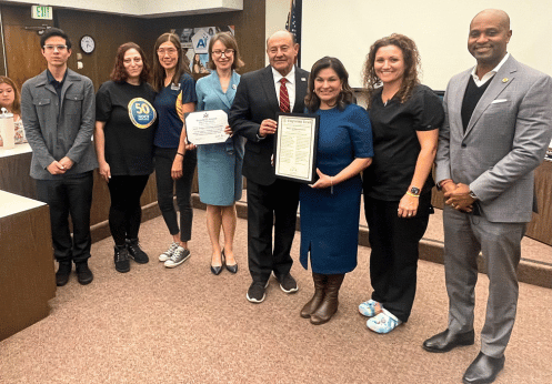 Accepting the certificate from Congressman Correa on behalf of NOCCCD was Board President Evangelina Rosales and Chancellor Dr. Byron D. Clift Breland. Representing NOCE included President Valentina Purtell, NOCE Academic Senate President Jennifer Oo, and student leaders Lourdes Valiente, Kristine Nacu, and Miguel Ángel Guerrero.
