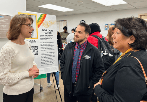 A photo of Anaheim City Council Members Norma Kurtz and Carlos Leon speaking with NOCE President Valentina Purtell at the 2025 NOCE Black History Month Event.