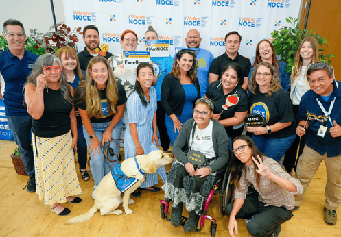 DSS staff and faculty posing for a larger group photo during NOCE's 2025 Opening Day