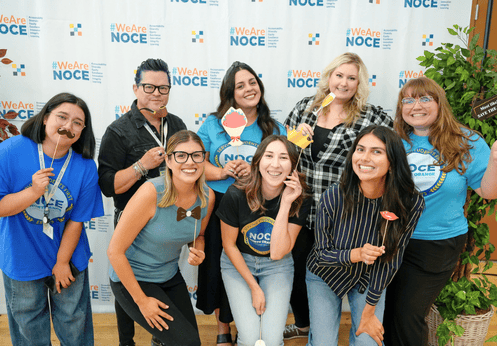 DSS staff and faculty posing for a fun group photo during NOCE's 2025 Opening Day
