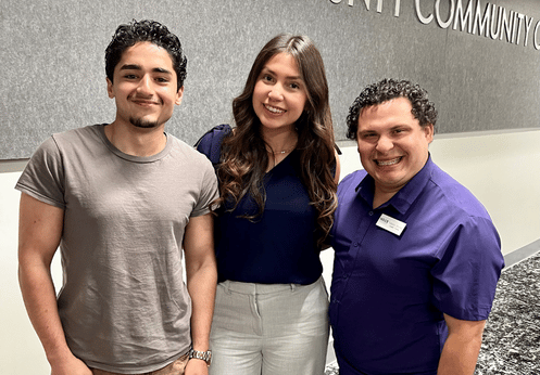 Yellckin Brenes with two colleagues at NOCE student trustee announcement event for 2026-27 term.